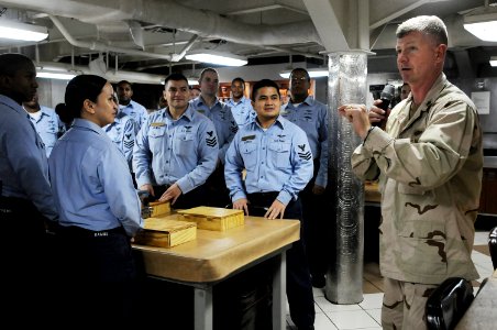 US Navy 090912-N-3659B-279 Master Chief Petty Officer of the Navy (MCPON) Rick West speaks with chief petty officer selects in the chief's mess of the aircraft carrier USS Ronald Reagan (CVN 76)