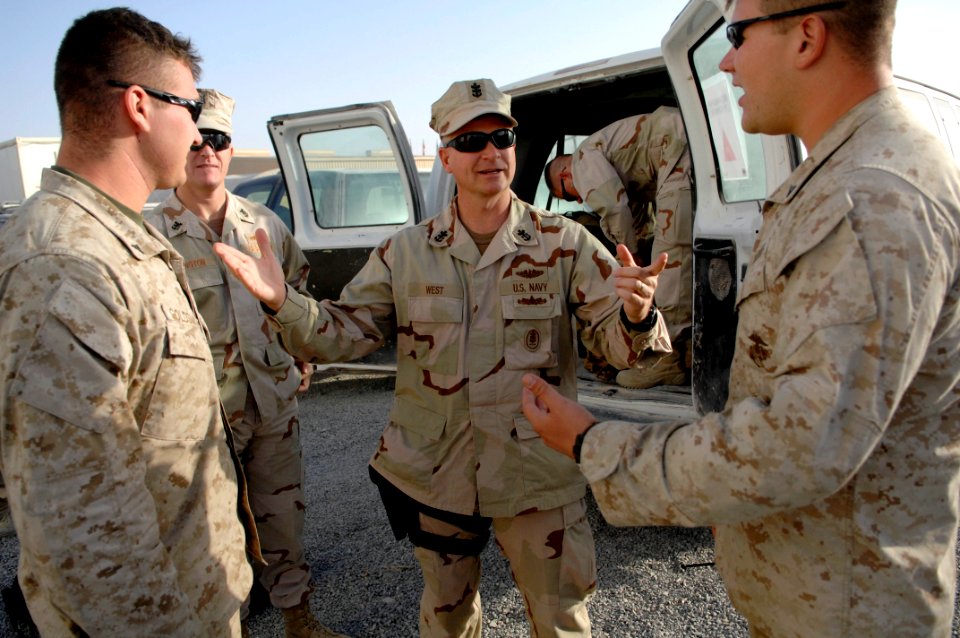 US Navy 090910-N-9818V-011 Master Chief Petty Officer of the Navy (MCPON) Rick West speaks with U.S. Marines during his stop to visit Sailors deployed at Camp Leatherneck