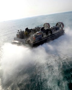 US Navy 090912-N-5345W-038 Landing Craft, Air Cushion (LCAC) 71, assigned to Assault Craft Unit (ACU) 4, returns to the Kuwaiti shore to retrieve equipment and Marines from the 22nd Marine Expeditionary Unit (22nd MEU)