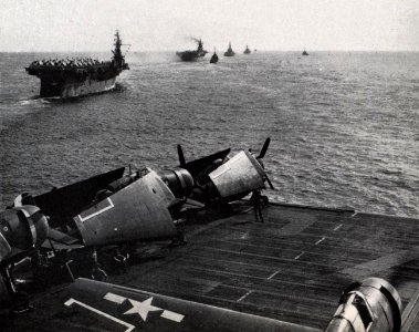 USS Belleau Wood (CVL-24) underway with other ships, in 1945