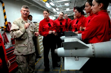 US Navy 090913-N-9818V-309 Master Chief Petty Officer of the Navy (MCPON) Rick West speaks with Sailors from the weapons department aboard the aircraft carrier USS Ronald Reagan (CVN 76)