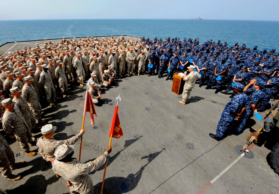 US Navy 090913-N-5345W-014 Capt. Jack Sotherland, commander of the Bataan Amphibious Ready Group (ARG), conducts an all-hands call with Sailors and Marines assigned to the amphibious dock landing ship USS Fort McHenry (LSD 43)
