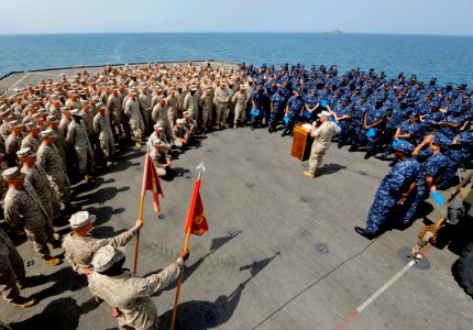 US Navy 090913-N-5345W-014 Capt. Jack Sotherland, commander of the Bataan Amphibious Ready Group (ARG), conducts an all-hands call with Sailors and Marines assigned to the amphibious dock landing ship USS Fort McHenry (LSD 43)