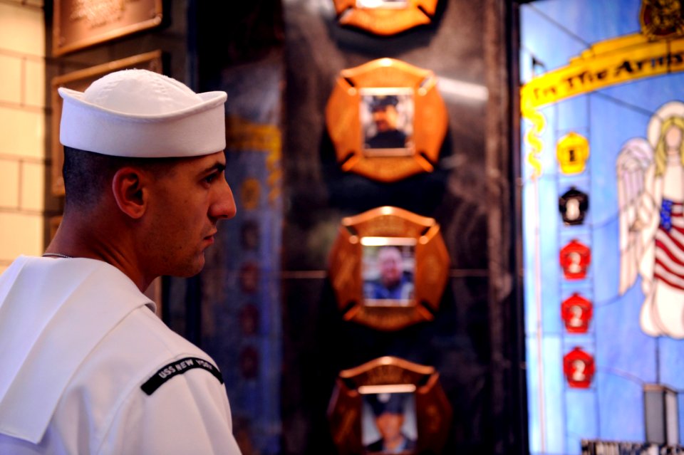 US Navy 090912-N-0413R-171 A Sailor assigned to the amphibious transport dock ship USS New York (LPD 21) tours the fire station of Engine 8, Ladder 2, 8th Battalion in New York City