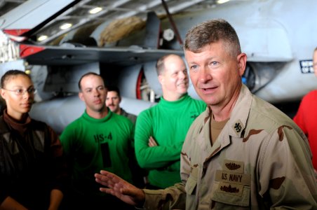 US Navy 090912-N-4995K-141 Master Chief Petty Officer of the Navy (MCPON) Rick West speaks to Sailors assigned to the Black Knights of Helicopter Anti-Submarine Squadron (HS) 4 in the hangar bay of the aircraft carrier USS Rona