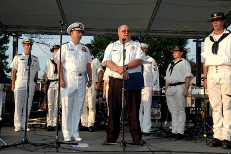 US Navy 090915-N-7975R-004 Chief John S. Senft, Department of Fire Rescue Services, presents a mayoral proclamation to Rear Adm. Scott Weikert, Deputy Commander, First Naval Construction Division, for York Navy Week