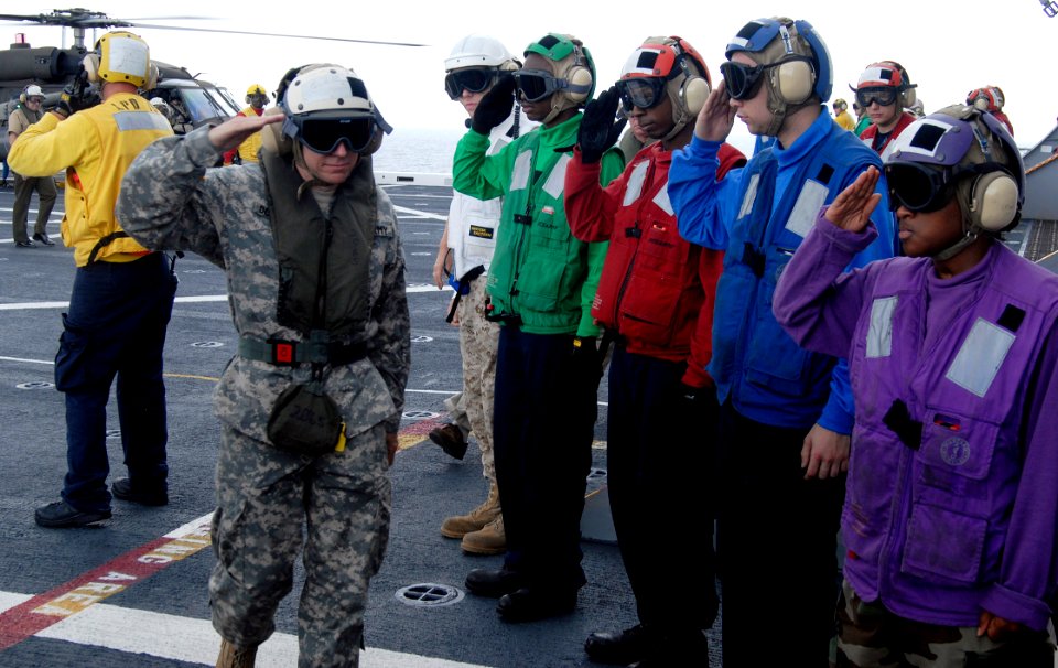 US Navy 090915-N-4879G-039 Brig. Gen. John J. Donnelly, deputy commander, 807th Medical Deployable Support Command, is welcomed aboard the amphibious dock transport ship USS Mesa Verde (LPD 19) by rainbow side boys