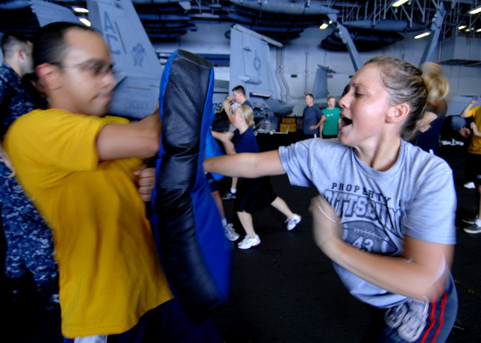 US Navy 090916-N-6003P-298 Damage Controlman 3rd Class Laurie Kaczmarik, participates in a shipboard reactionary force-basic course