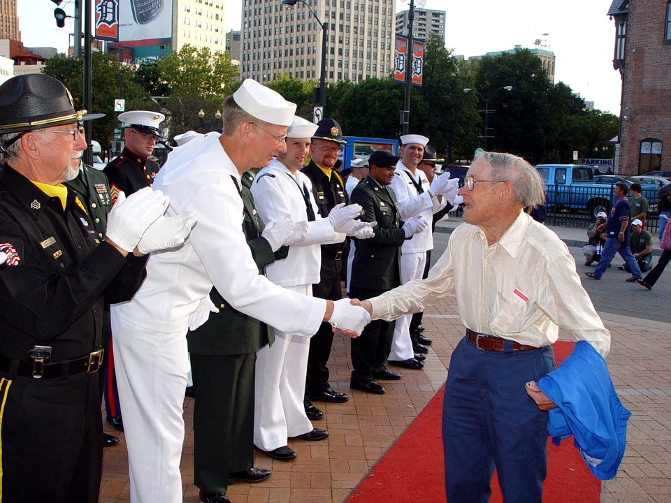 US Navy 090916-N-2888Q-002 Chief petty officer (Sel.) Timothy Link, assigned to Navy Operational Support Center Detroit, shakes hands with a World War II veteran