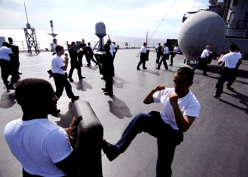 US Navy 090915-N-4399G-096 Sailors train during a ship's reactionary force non-lethal weapons class on the main deck of the amphibious command ship USS Blue Ridge (LCC 19)