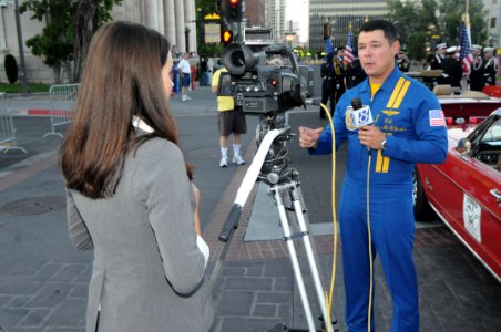 US Navy 090916-N-6220J-003 Cmdr. Greg McWherter, commanding officer of the U.S. Navy flight demonstration squadron, the Blue Angels, is interviewed by a TV