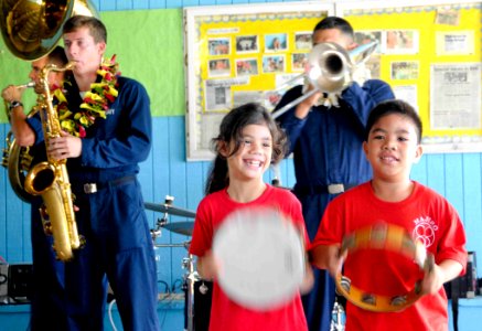 US Navy 090914-N-9689V-002 School children play instruments as the Pacific Fleet Band performs at Majuro Cooperative School during a Pacific Partnership 2009 community service project