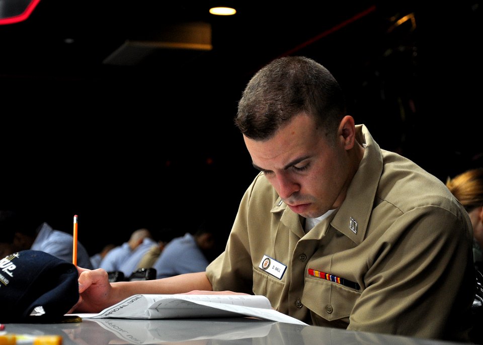 US Navy 090917-N-2013O-012 Hospitalman Daniel Nall, from Corinth, Miss., takes the 3rd class petty officer exam at the base enlisted club at Commander, Fleet Activities Yokosuka