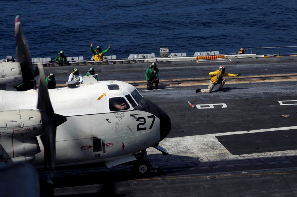US Navy 090917-N-3038W-110 Air department Sailors prepare to launch a C-2A Greyhound aircraft assigned to the Providers of Carrier Logistics Support Squadron (VRC) 30 aboard the aircraft carrier USS Nimitz (CVN 68)