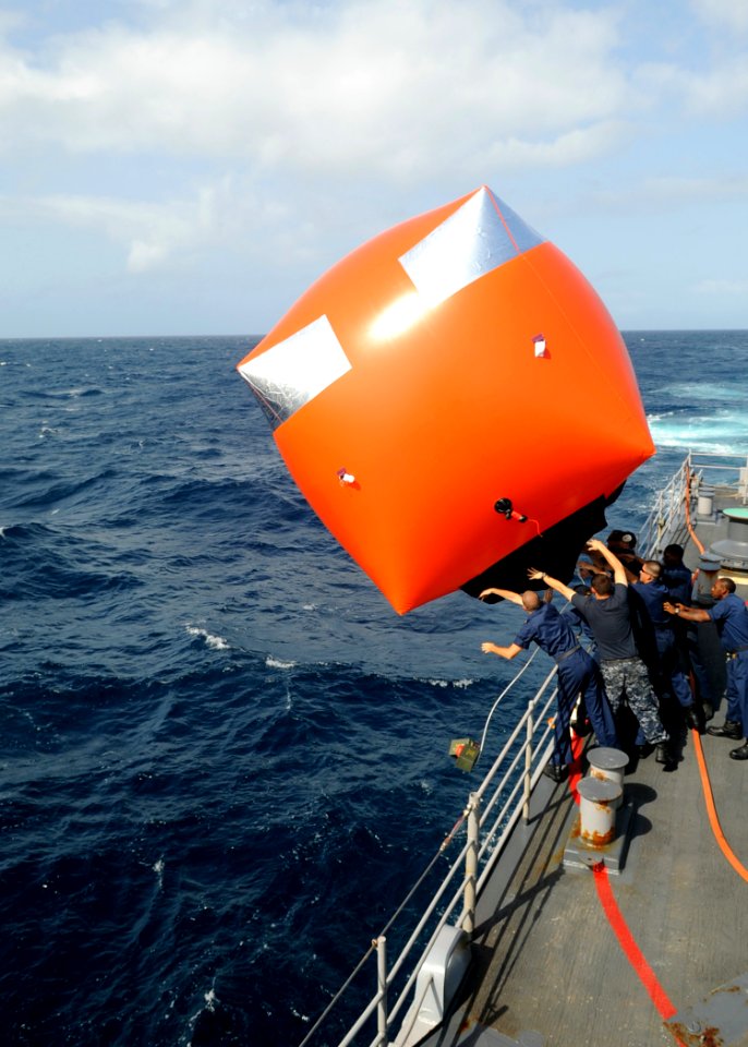 US Navy 090915-N-6814F-107 ailors launch a Navy gunnery target balloon, or killer tomato, from the guided-missile cruiser USS Anzio (CG 68) during a live-fire exercise