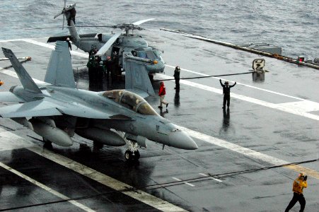 US Navy 090916-N-8960W-173 Alert aircraft aboard the aircraft carrier USS Nimitz (CVN 68) move into position for launch photo