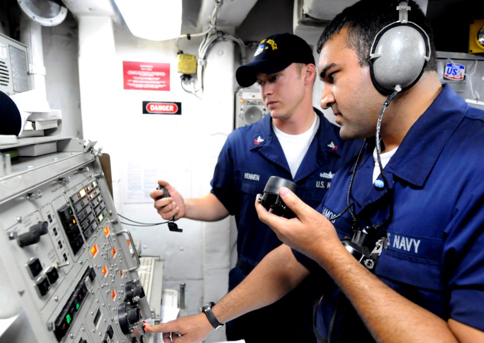 US Navy 090916-N-7280V-287 Fire Controlman Seaman Patrick Ramos and Fire Controlman 2nd Class Derek Hennen assigned to the amphibious command ship USS Blue Ridge (LCC 19) test-fire the Phalanx close-in weapons system or CIWS