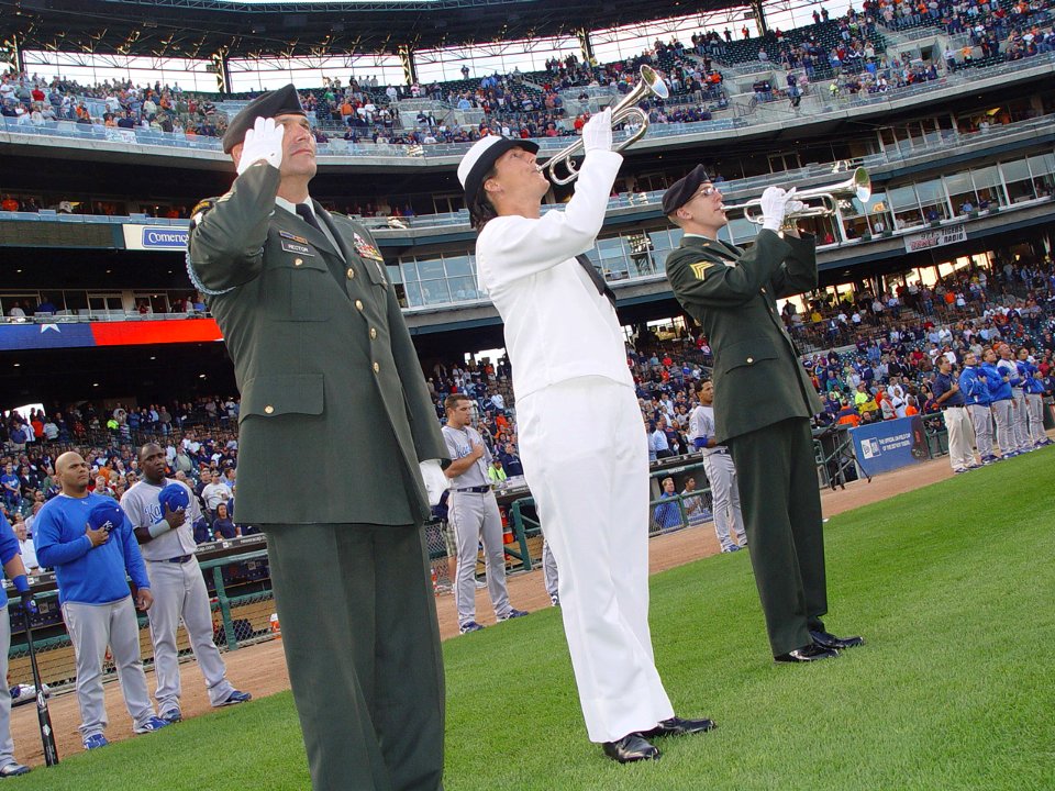 US Navy 090916-N-2888Q-001 Master Sgt. Jeff Rector, left, U.S. Army Michigan coordinator for casualty assistance calls, salutes