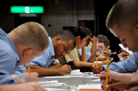 US Navy 090917-N-2013O-001 Sailors assigned to various shore commands at Commander, Fleet Activities Yokosuka take the 3rd class petty officer rating exam at the base enlisted club