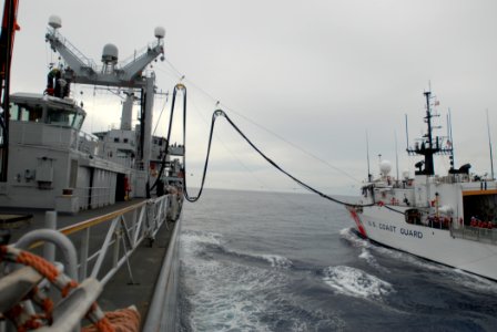 US Navy 090917-N-8590G-009 The Dutch navy fast combat support ship HNLMS Amsterdam (A386) conducts a replenishment at sea with the U.S. Coast Guard cutter Mohawk (WMEC 913) photo