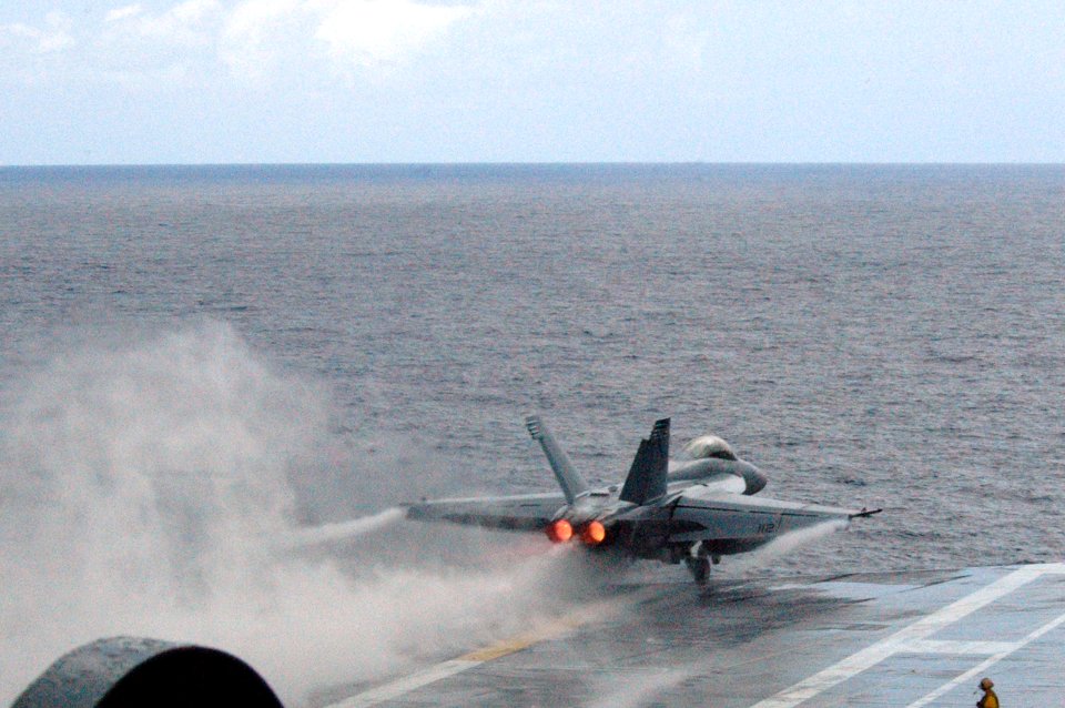US Navy 090916-N-8960W-174 An F-A 18F Hornet assigned to the Tophatters of Strike Fighter Squadron (VFA) 41 launches from the aircraft carrier USS Nimitz (CVN 68) to refuel airborne alert fighters