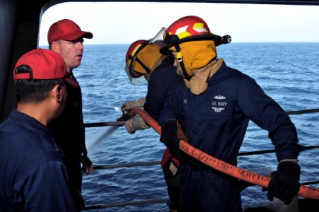 US Navy 090922-N-3038W-095 Members of the ship's flying squad take part in a rescue and assistance team drill aboard the aircraft carrier USS Nimitz (CVN 68)