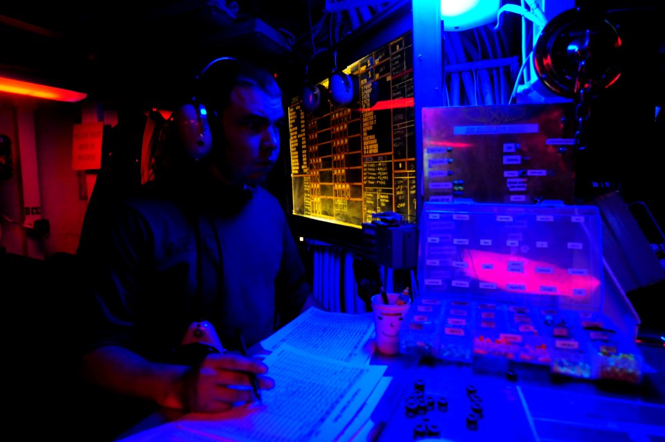 US Navy 090919-N-6538W-466 Aviation Boatswain's Mate (Fuels) Airman Jacob Welch, from Dallas, Texas, stands the aviation fuels representative watch in flight deck control