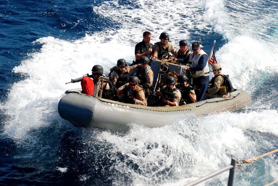 US Navy 090924-N-0789J-206 The visit, board, search and seizure (VBSS) team, assigned to the guided-missile cruiser USS Anzio (CG 68) and U.S. Coast Guard Maritime Safety and Security Team 91104 conduct a simulated boarding exe