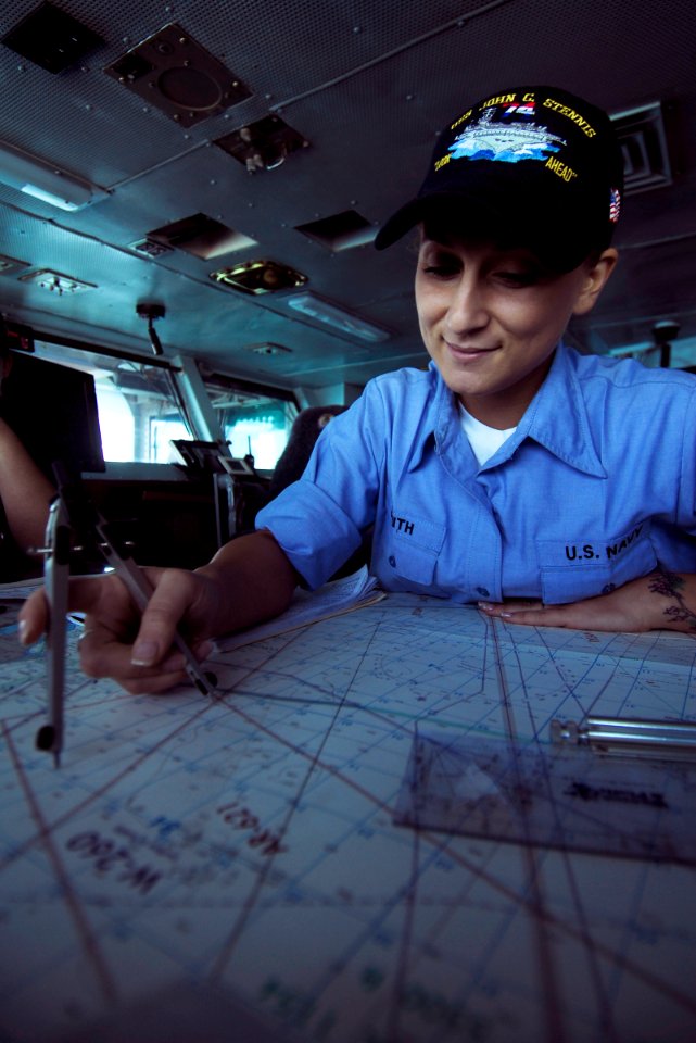 US Navy 090921-N-6538W-004 Quartermaster 3rd Class Jessa Smith, from Grants Pass, Ore., assigned to the aircraft carrier USS John C. Stennis (CVN 74) plots