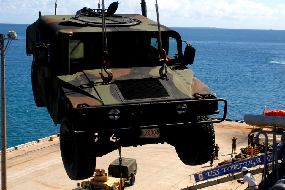 US Navy 090926-N-6692A-118 An armored vehicle assigned to the 31st Marine Expeditionary Unit (31st MEU) is loaded onto the amphibious dock landing ship USS Tortuga (LSD 46) in preparation for Fall Patrol