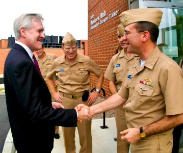 US Navy 090923-N-2051S-001 The Secretary of the Navy (SECNAV) the Honorable Ray Mabus is greeted by Rear Adm. Arnold Lotringduring the Secretary's tour of Naval Submarine School's newly-constructed $17 million Submarine Escape