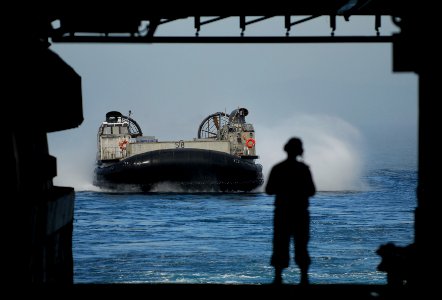 US Navy 090923-N-0807W-172 Landing Craft, Air Cushion (LCAC) 58 assigned to Assault Craft Unit (ACU) 5 prepares to enter the well deck