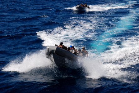 US Navy 090924-N-0789J-214 The visit, board, search and seizure (VBSS) team, assigned to the guided-missile cruiser USS Anzio (CG 68) and U.S. Coast Guard Maritime Safety and Security Team 91104 conduct a simulated boarding exe