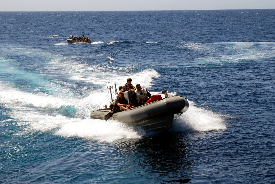 US Navy 090924-N-0789J-163 The visit, board, search and seizure (VBSS) team, assigned to the guided-missile cruiser USS Anzio (CG 68) and U.S. Coast Guard Maritime Safety and Security Team 91104 conduct a simulated boarding exe