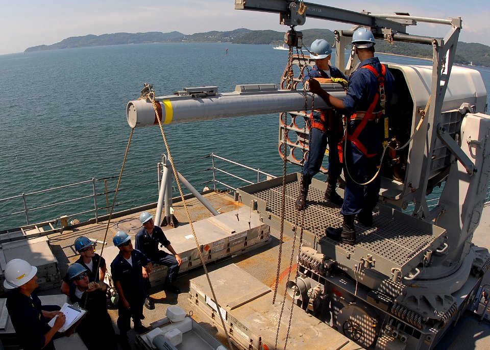 US Navy 090924-N-6692A-063 Sailors assigned to the amphibious dock landing ship USS Tortuga (LSD 46) load the Rolling Airframe Missile (RAM) system