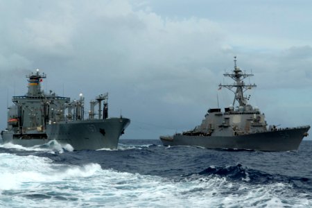 US Navy 090928-N-9123L-044 he guided-missile destroyer USS Curtis Wilbur (DDG 54) breaks away from the Military Sealift Command fleet replenishment oiler USNS Pecos (T-AO-197) after completing a refueling at sea