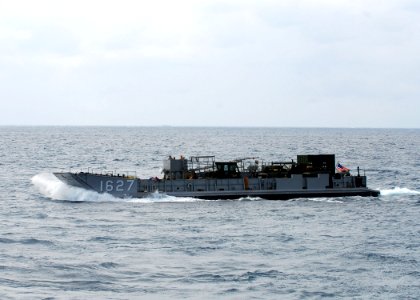 US Navy 090925-N-5538K-002 A landing craft utility transports 31st Marine Expeditionary Unit (31st MEU) equipment to the amphibious transport dock ship USS Denver (LPD 9)