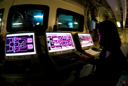 US Navy 090928-N-2918M-068 Aviation Boatswain's Mate (Fuel) Airman Miesherrae Newberry monitors levels of JP-5 jet fuel in pump room Nnumber Two of the aircraft carrier USS Nimitz (CVN 68)
