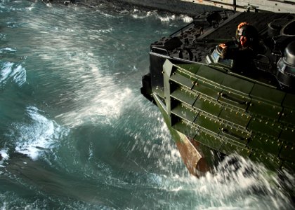 US Navy 090928-N-5538K-219 A Marine attached to the 31st Marine Expeditionary Unit embarked aboard the forward-deployed amphibious transport dock ship USS Denver (LPD 9)