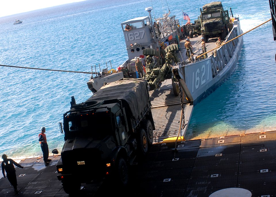 US Navy 090926-N-6692A-119 Landing Craft Utility (LCU 1627) transports personnel assigned to the 31st Marine Expeditionary Unit (31st MEU) and logistic equipment to the amphibious dock landing ship USS Tortuga (LSD 46)
