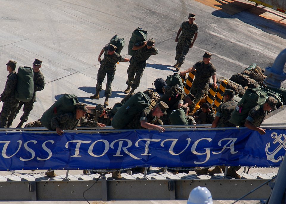 US Navy 090926-N-6692A-124 Members of the 31st Marine Expeditionary Unit (31st MEU) embark aboard the amphibious dock landing ship USS Tortuga (LSD 46) for Fall Patrol