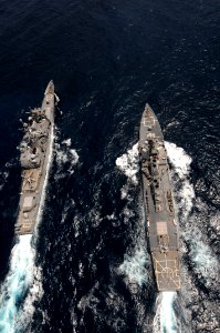 US Navy 090927-N-1635S-565 The guided-missile destroyer USS Gridley (DDG 101), left, passes the guided-missile cruiser USS Chancellorsville (CG 62) during exercises with the Royal Thai Navy