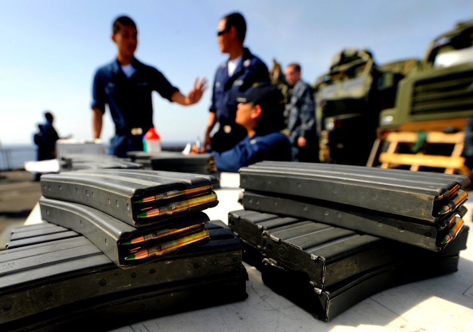 US Navy 090930-N-5345W-078 Loaded magazines with 5.56mm rounds are ready for the M-16-M-4 weapons qualifications on the flight deck of the amphibious dock landing ship USS Fort McHenry (LSD 43)