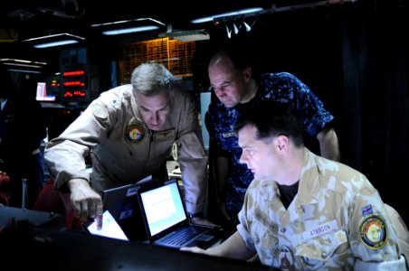 US Navy 091001-N-4154B-049 Rear Adm. Scott E. Sanders, commander of Combined Task Force (CTF) 151, and Capt. Paul McElroy, deputy commander of CTF 151