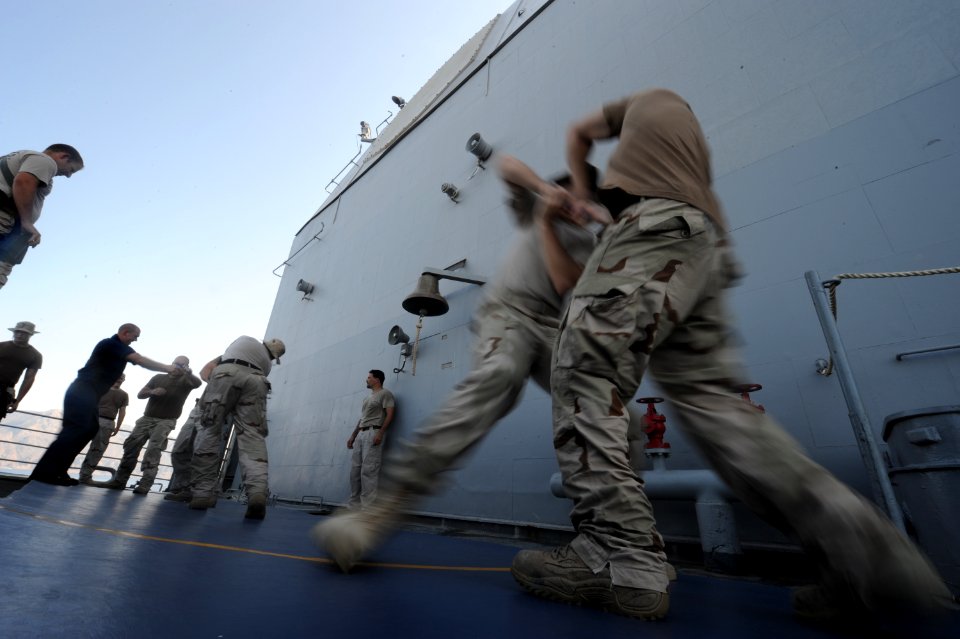 US Navy 090926-N-4154B-319 A combined team of U.S. Navy visit, board, search and seizure team members from the guided-missile cruiser USS Anzio (CG 68) and members of U.S. Coast Guard Maritime Safety and Security Team conduct w