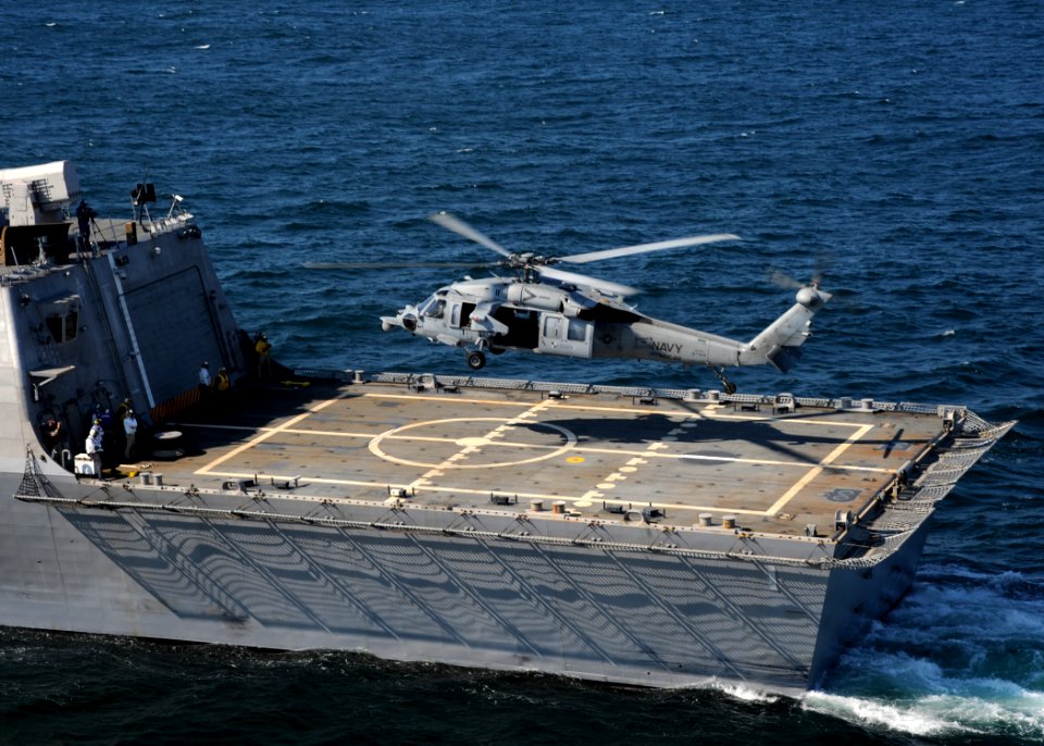 US Navy 090928-N-7241L-306 The littoral combat ship USS Freedom (LCS 1) conducts flight deck certification with an MH-60S Sea Hawk helicopter assigned to the Sea Knights of Helicopter Sea Combat Squadron (HSC) 22