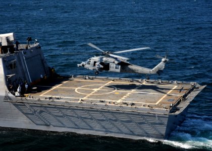 US Navy 090928-N-7241L-306 The littoral combat ship USS Freedom (LCS 1) conducts flight deck certification with an MH-60S Sea Hawk helicopter assigned to the Sea Knights of Helicopter Sea Combat Squadron (HSC) 22