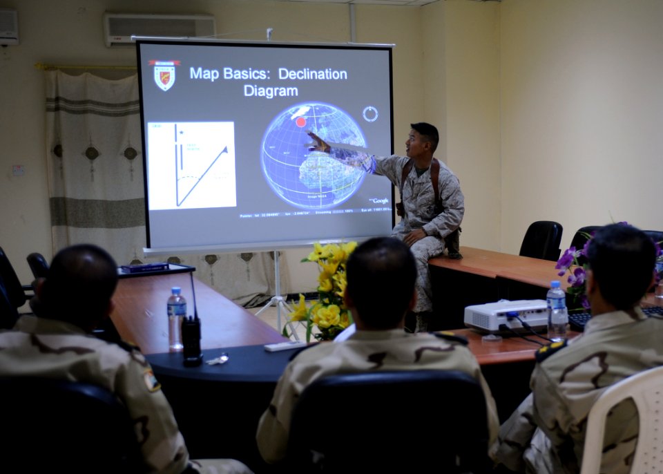 US Navy 090928-N-7088A-074 U.S. Marine 1st Lt. Ralph Derek Rey, assigned to 1st Battalion, 7th Marines, teaches Iraqi army and navy operations officers basic land