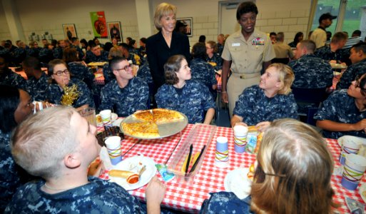 US Navy 091001-N-8848T-020 Patricia Adams, left, Deputy Assistant Secretary of the Navy for Civilian Human Resources, and Capt. Annie B. Andrews, executive assistant and naval aide, talk with recruits