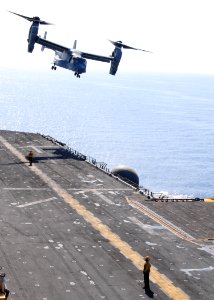US Navy 091002-N-3165S-281 An MV-22B Osprey assigned to Marine Medium Tiltrotor Squadron (VMM) 263 (Reinforced), 22nd Marine Expeditionary Unit (22nd MEU), takes off from the flight deck of the multi-purpose amphibious assault